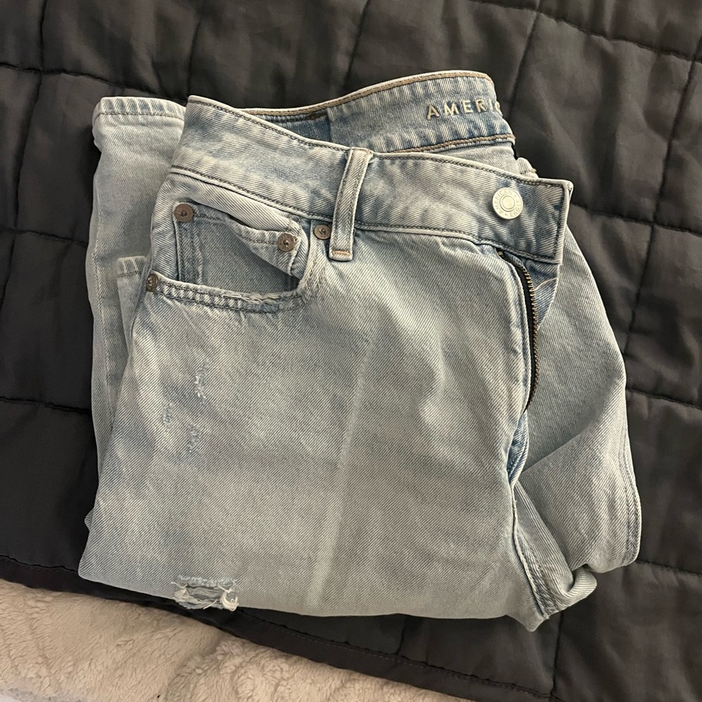 AE ripped light wash jeans